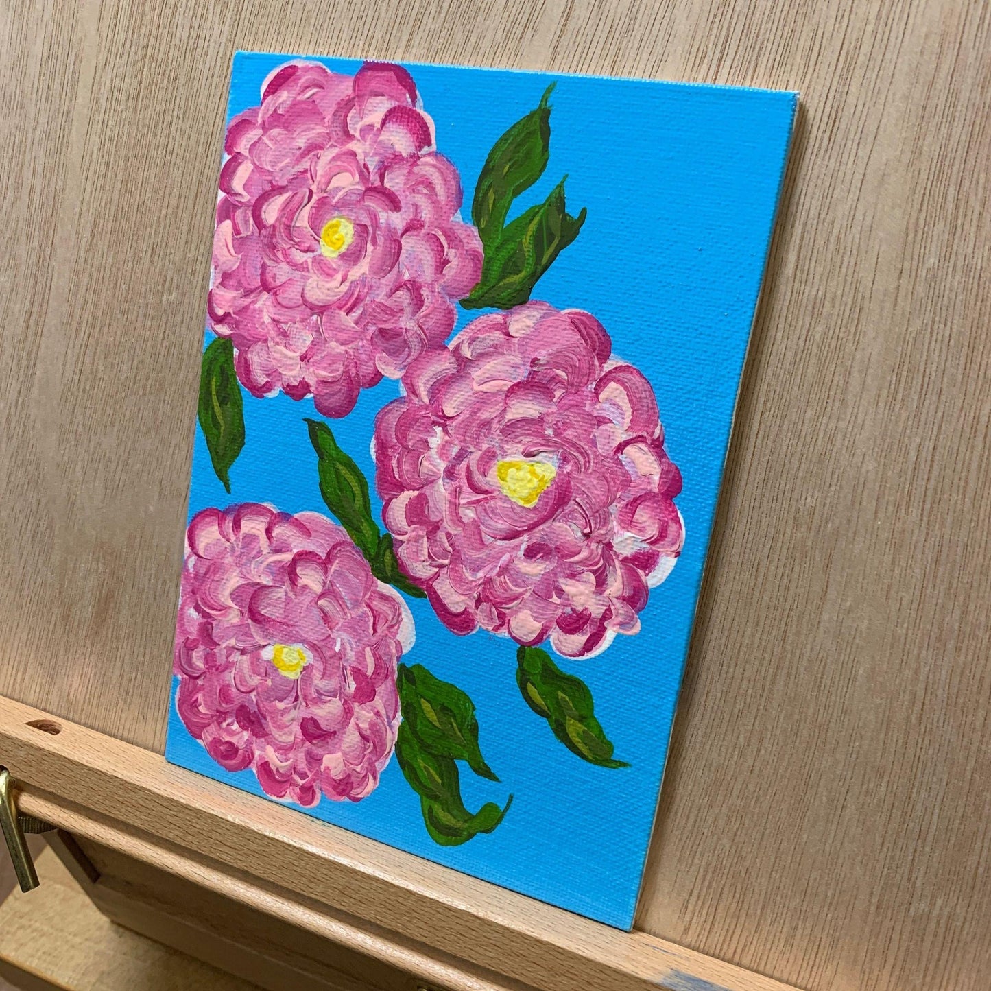 Magenta Flowers Painting, Wide Pedals, Yellow Pistil, Broad Green Leaf's, Beautiful Blue Background, Acrylic Artwork, Artist Signed, 5 x 7